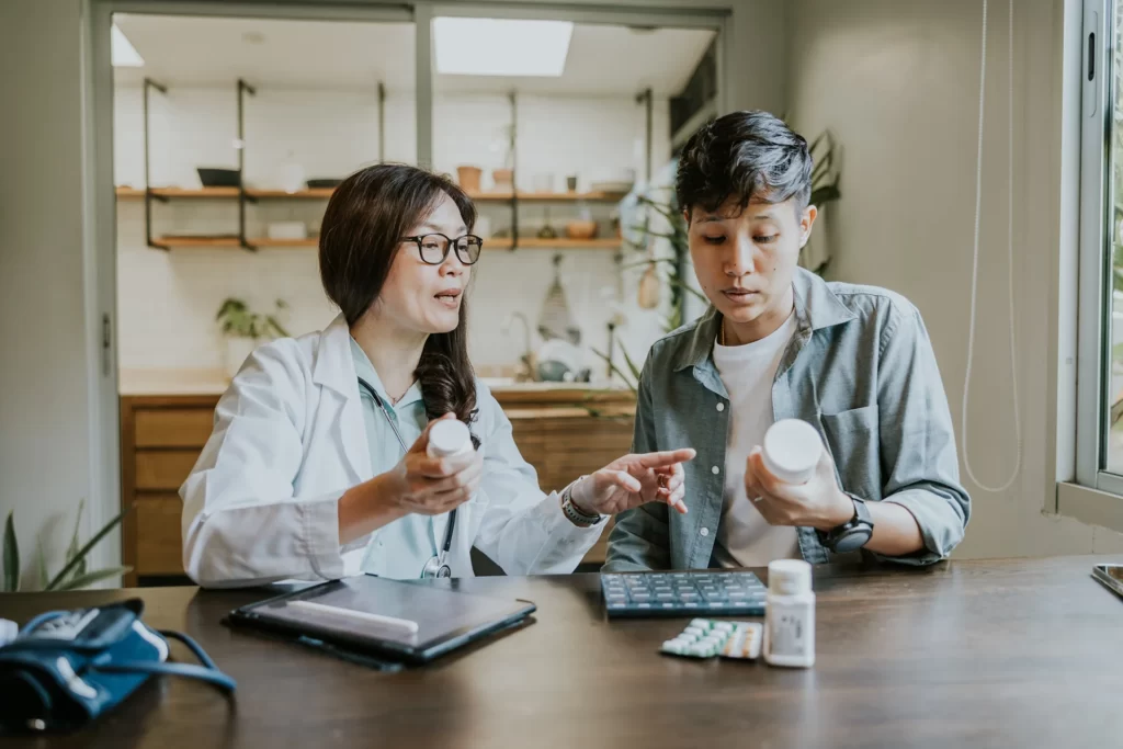 doctor and transgender man patient during testosterone hormone consultation